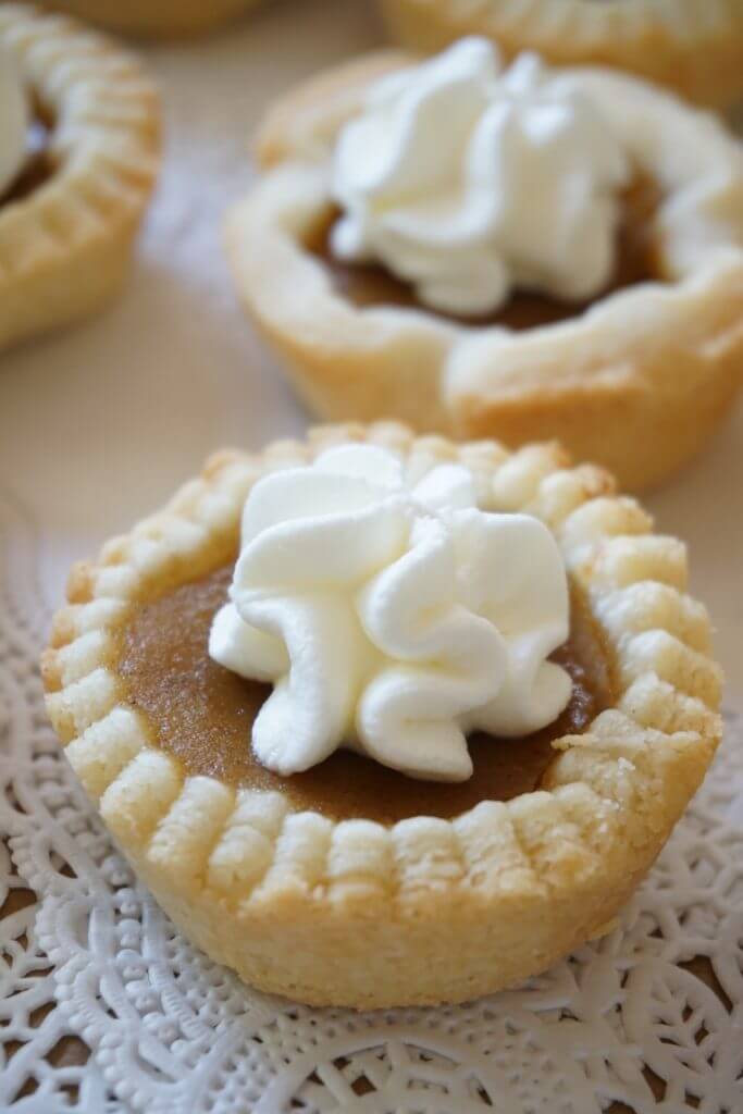 Mini Pumpkin Pie Recipe by Baking for Friends. A little twist on the traditional pumpkin pie. These adorable bite size mini pumpkin pies are the perfect treat to finish off that heavy Thanksgiving dinner