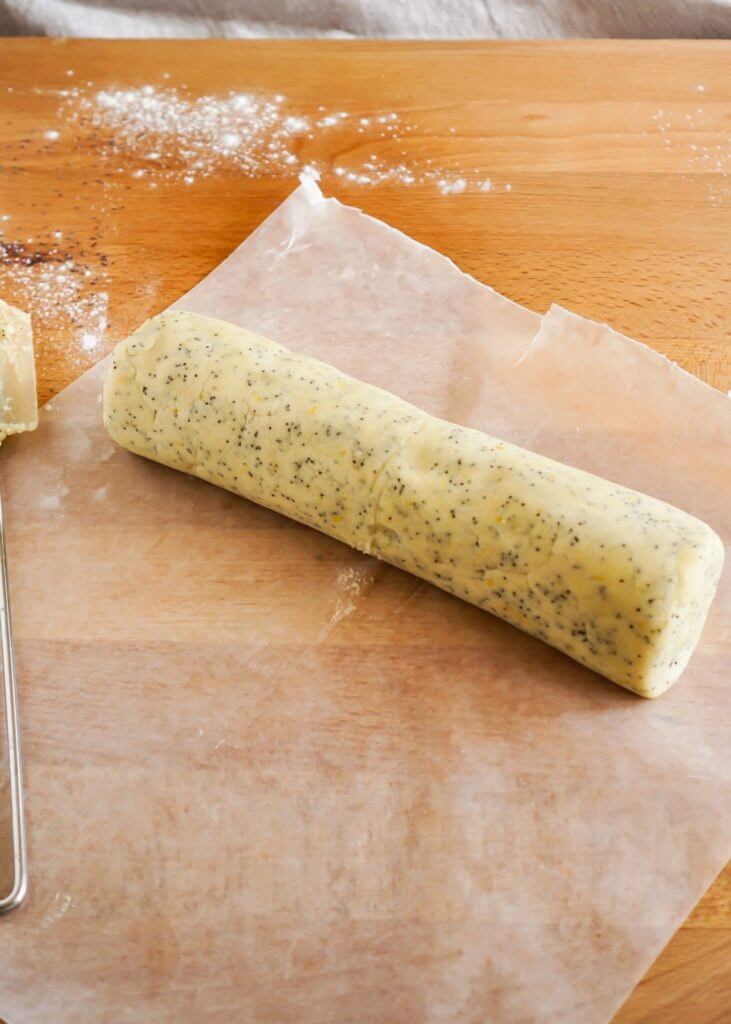 rolling dough into a 10-12 inch log, wrap in wax paper to make lemon poppyseed cookies